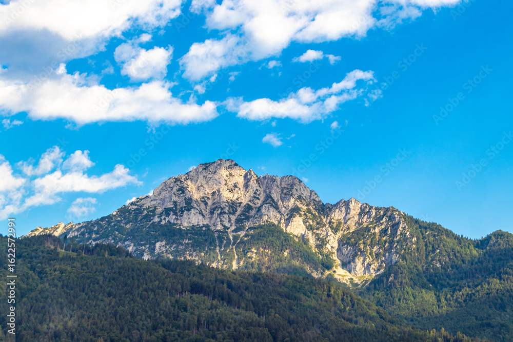 Fototapeta premium Alpine mountain and hill landscape panorama blue sky Salzburg Austria.