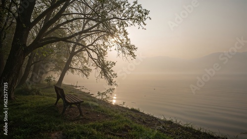 Calm early morning with mist over the lake
