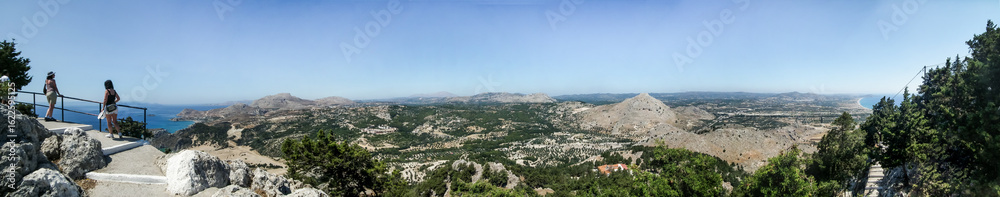Obraz premium View of islands and Mediterranean Sea from mountain where Holy Monastery of Virgin Mary Tsambika Kyra Psili is located on Rhodes island in Greece