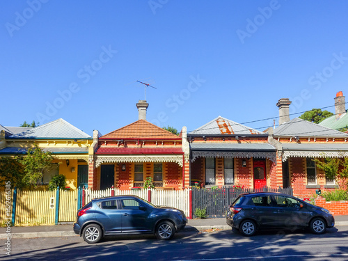 Quadro su tela Heritage terrace houses in inner-city Melbourne, Australia, featuring ornate iron lacework, tiled roofs, and classic Victorian architecture