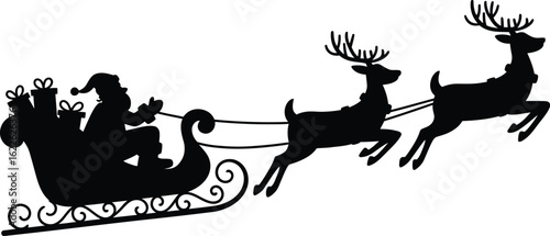 Silhouette of santa claus in a sleigh pulled by reindeer