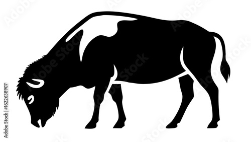 Silhouette of a bison grazing with head down in black and white simple vector illustration style art