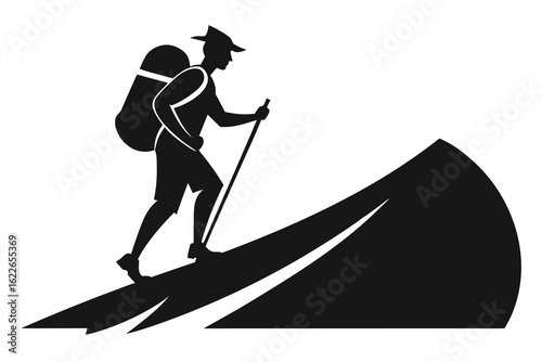 Black and White of a Man Hiking Up a Mountain Slope with Backpack