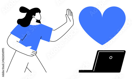 Woman facing laptop, extending arm toward large blue heart representing digital connection and emotion. Ideal for technology, communication, online relationships, digital health, user engagement