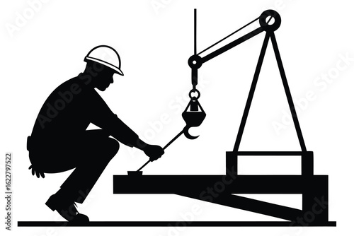 Silhouette of Construction Worker with Hard Hat Using Crane Equipment in Black and White