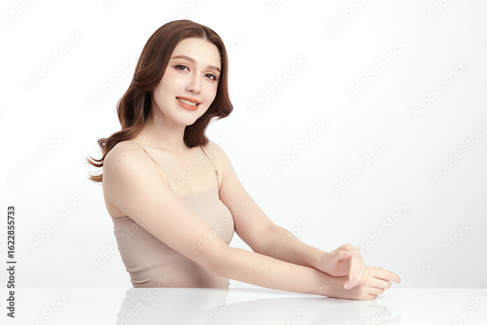 A beautiful young Asian woman with clean, fresh skin against a white background. Skincare, facial treatment, cosmetology, beauty, and spa. An elegant portrait of an Asian woman. A beautiful young Asian woman with clean, fresh skin against a white background. Skincare, facial treatment, cosmetology, beauty, and spa. An elegant portrait of an Asian woman.