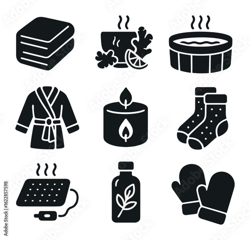 Winter Spa Essentials. olid, filled icons set of winter spa essentials: warm blanket, ginger tea, hot tub,