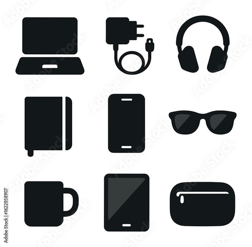 Digital Nomad Essentials. olid, filled icons set of flat lay digital nomad gear: laptop, charger, headphones,