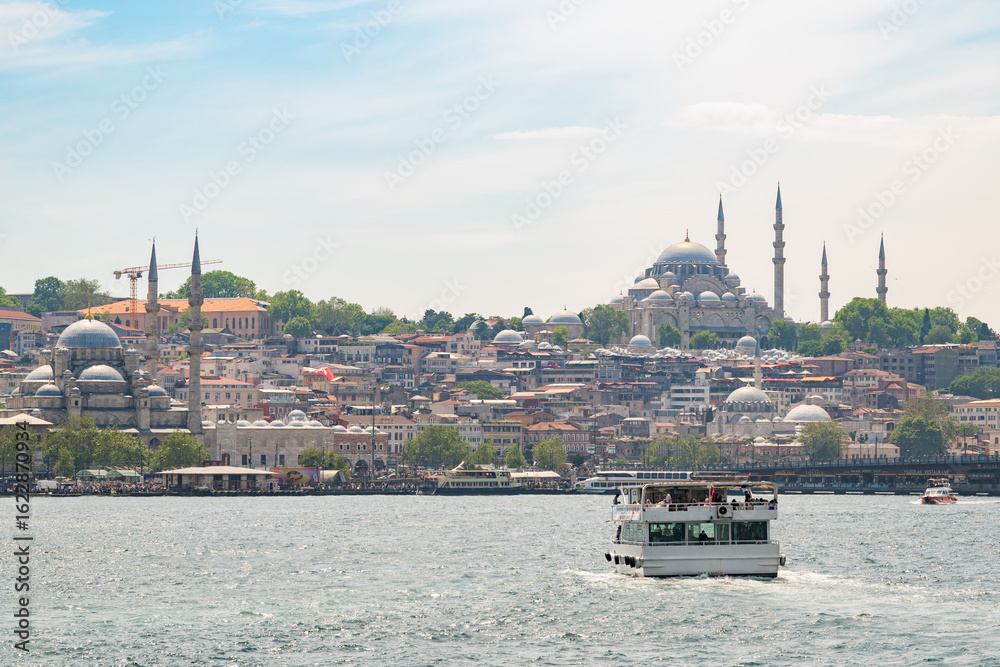 Fototapeta premium A view of the European side of Istanbul, including multiple mosques, from the Bospherous