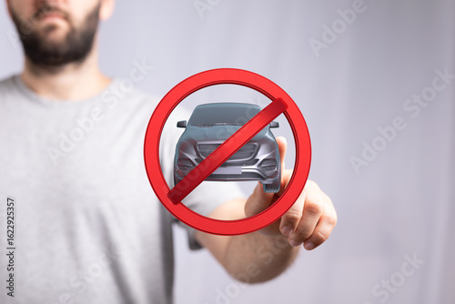 Image of a man holding a no...