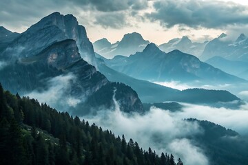 Tableau sur plexiglas  Mountains with clouds, fog, and snow create a dramatic and majestic landscape  © Atif
