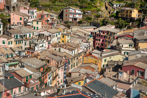 Vernazza, Cinque Terre, nestled among terraced vineyards with brightly colore...