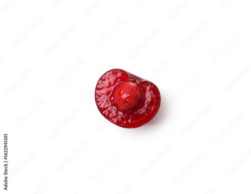 Fototapeta premium Half of ripe cherry isolated on white, top view