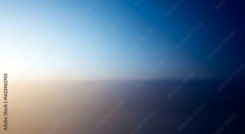 Obraz premium Blurred abstract background of a sunset over the ocean horizon