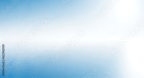 Bright sunlight over a hazy blue horizon on a clear day