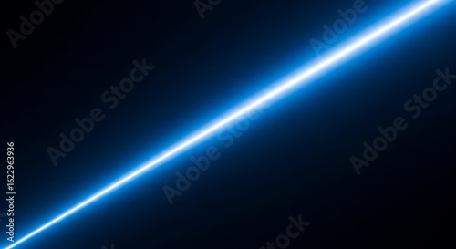 Bright blue light beam diagonally across a dark background