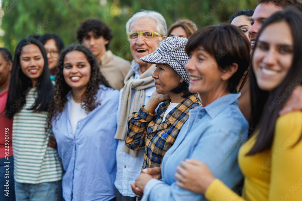 Obraz premium Crowd of multiracial people having fun together at city park - Social gathering and multi generational community concept - Focus on elderly thai woman face