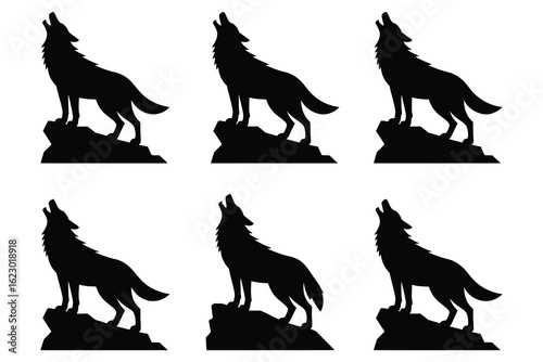 Black wolf howling on rocky outcrops silhouette white