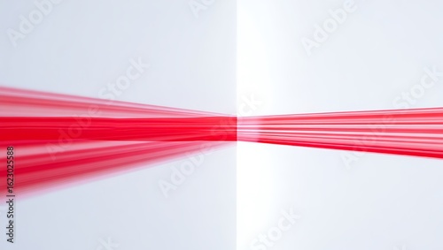 Abstract red ribbon flowing horizontally with motion blur, creating a sense of speed and movement against a clean white background
