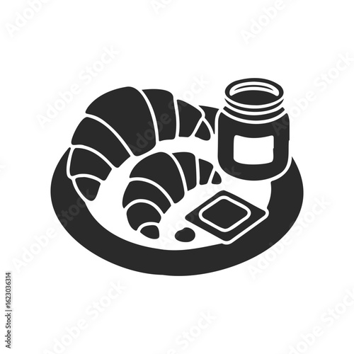 Breakfast delight: croissants with jam and butter on plate