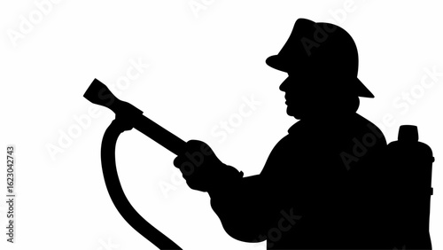 Silhouette of a firefighter holding a hose with a tank on his back against a white background scene view