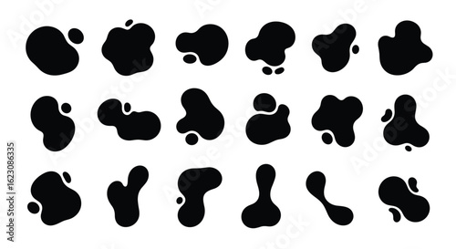 Abstract organic shapes in black and white representing liquid splashes ink blots and amoeba forms