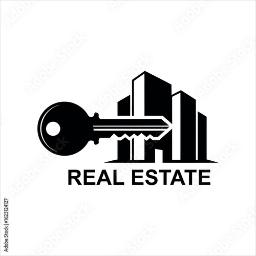 Black key and silhouette of buildings with text real estate architecture