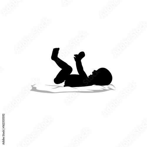 Silhouette of a baby laughing while lying on belly on white background