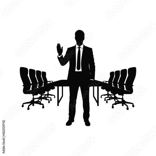 Silhouette of a businessman raising his hand in a boardroom