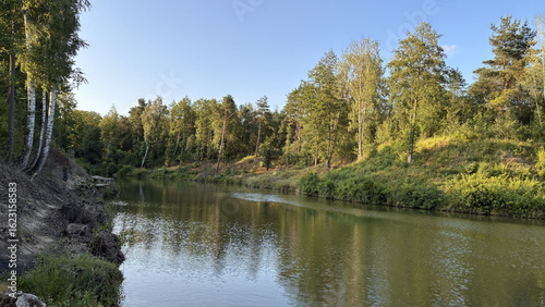 Scenic Forest River Landscape at Sunset