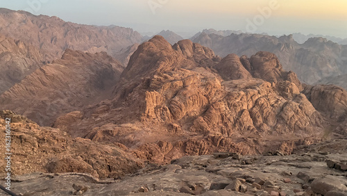 Rock Formations and Mountain Ridges in Golden Hour Light