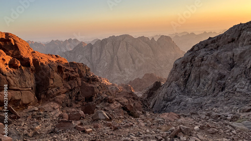 Desert Sunset with Rugged Mountain Ridges
