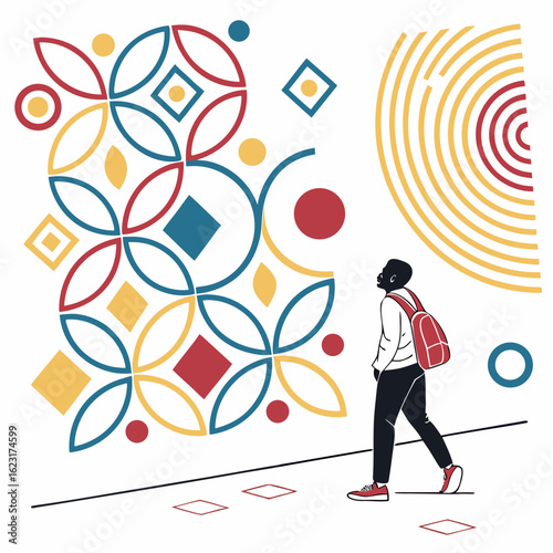 Man admiring geometric art on a wall in an urban setting