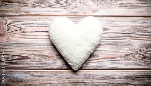 Soft White Heart on Rustic Wood: A Romantic and Textured Composition