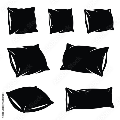 Art of collection of seven black pillow and cushion silhouettes isolated on a white background, showcasing various shapes and sizes for design elements