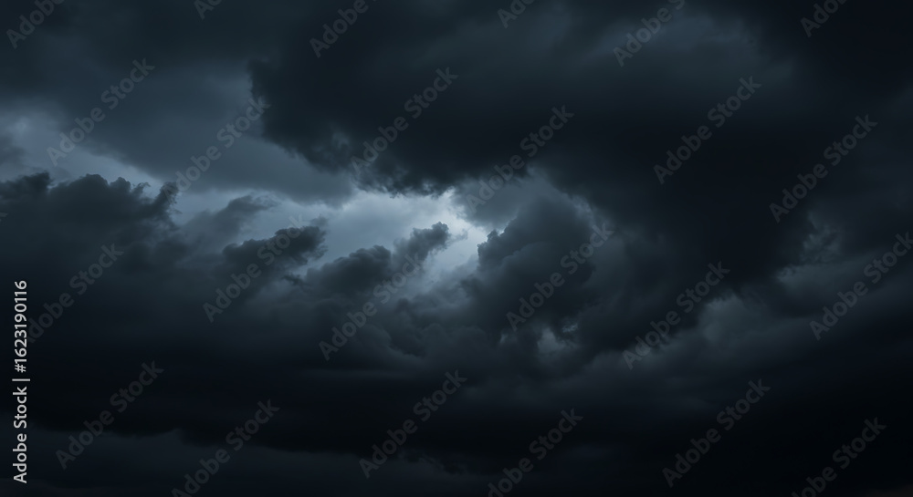 Obraz premium Dramatic dark storm clouds with a flash of lightning