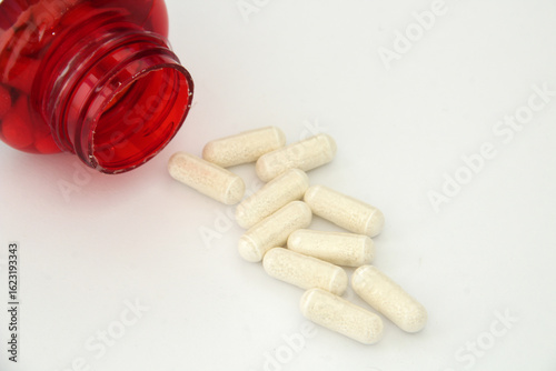 Antidepressants and medical bottle on light white background
