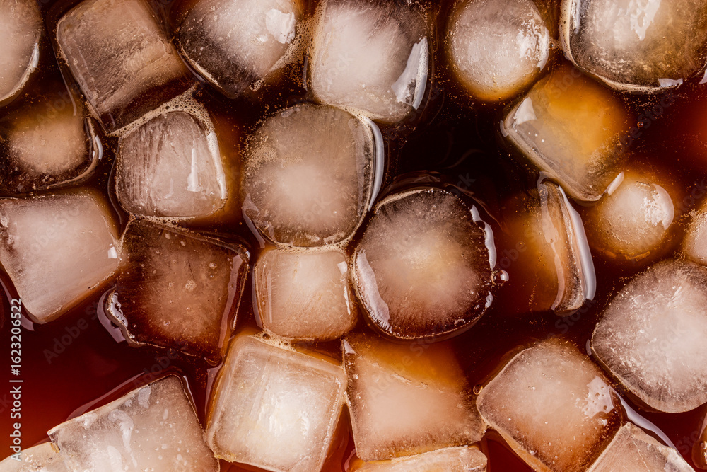 Iced cold brew coffee with ice cubes in close-up view Iced cold brew coffee with ice cubes in close-up view