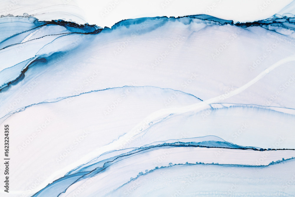 Obraz premium Beautiful abstract art created with alcohol ink on white canvas showcasing vibrant blue tones