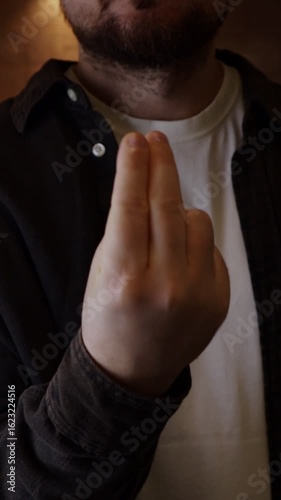 Italian hand gesture of perfecto appreciation symbol, belissimo