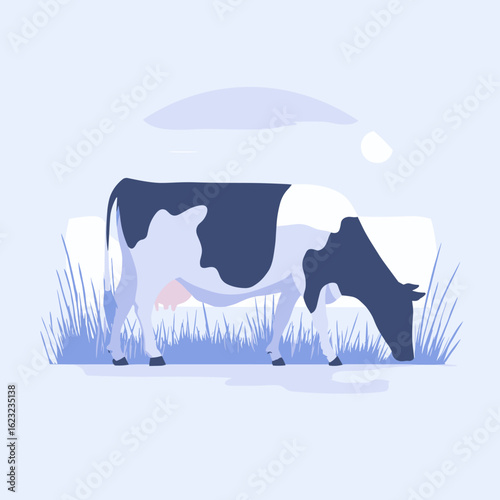A cow is peacefully grazing in a field.