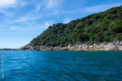 Scenic Rocky Coastline with Lush Greenery