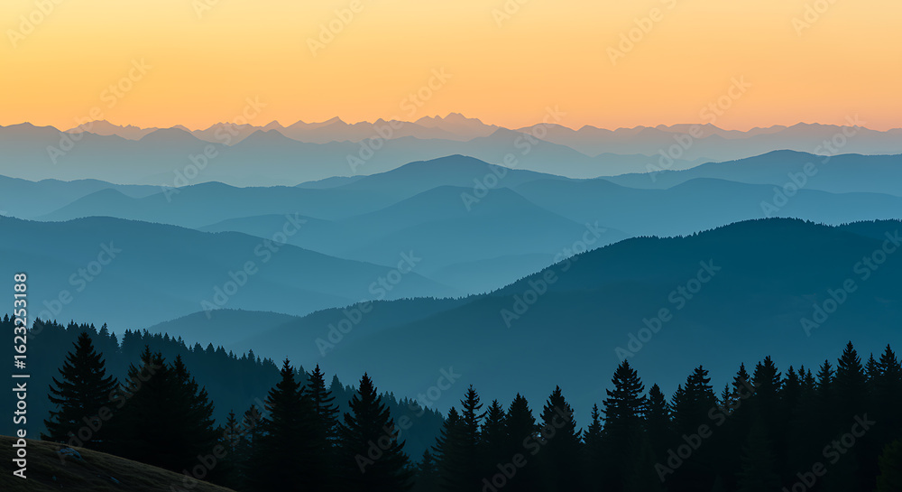 Obraz premium Layered mountain ranges at sunrise with evergreen forest foreground mountains orange