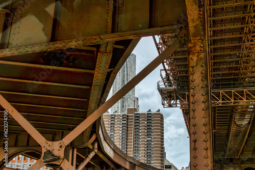 Looking at buildings from under the bridge