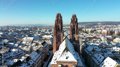 Winter cityscape with snow-covered rooftops