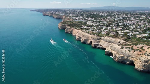 Wallpaper Mural Boats travel the shore in the Algarve region of Portugal Torontodigital.ca