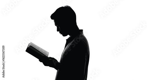 Silhouette of a Man Reading a Book, Absorbed in Literature, Exploring Knowledge and Education