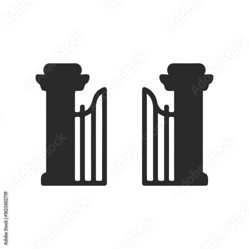 Silhouette of open ornamental gate with two pillars