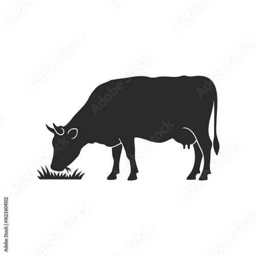 Silhouette of a cow grazing on grass: farm animal illustration in black and white