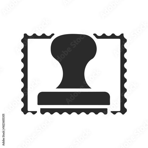 Black silhouette of a rubber stamp with a decorative frame